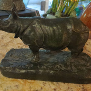 metal rhinoceros sculpture